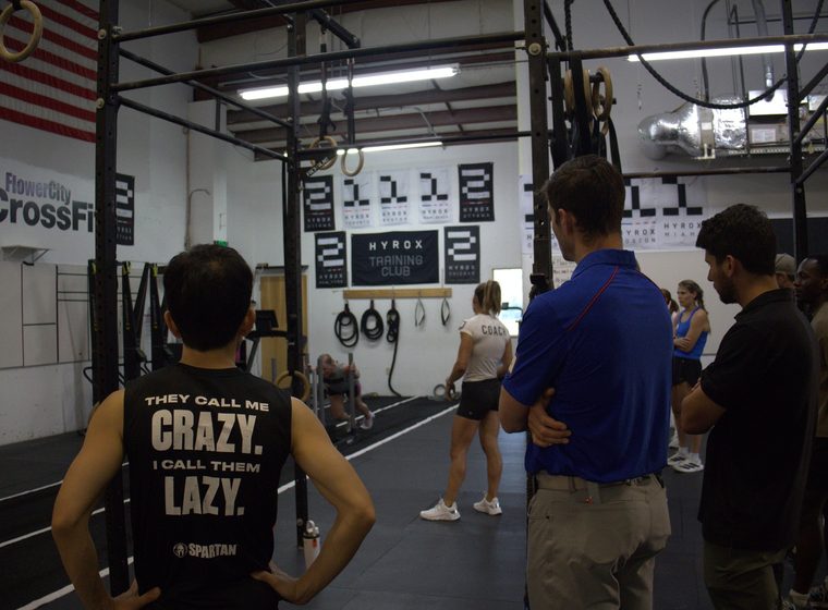 Members listening to the workout brief